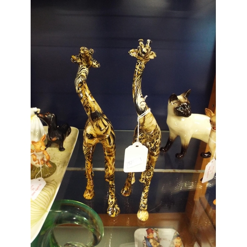 22A - A pair of collage kissing giraffes