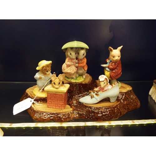 12 - A Beswick tree bark five place stand with Royal Albert Goody and Timmy Tiptoe, Pigling Eats his Porr... 