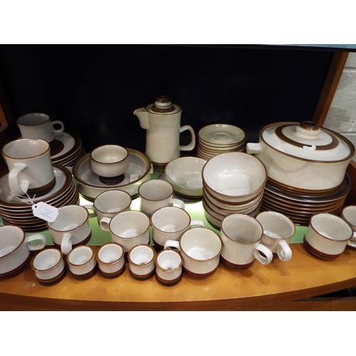 123 - A large selection of Denby Stoneware tea and dinner ware