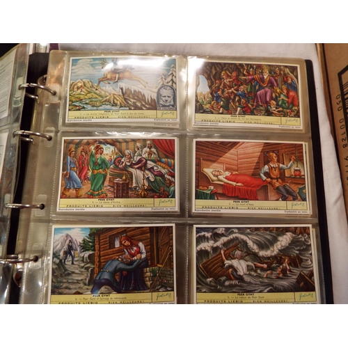 126 - A mixed selection of Liebig trading cards to include 'Corps Expeditionnaires Belgs', 'Peer Gynt', 'R... 