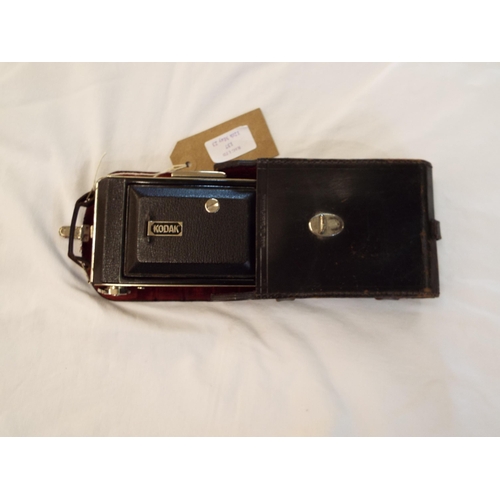 137 - A vintage Kodak camera in leather case