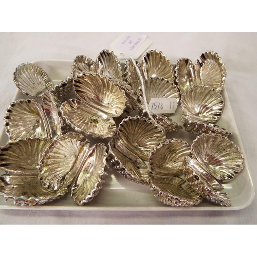 167 - A set of 14 white metal table scallop place settings