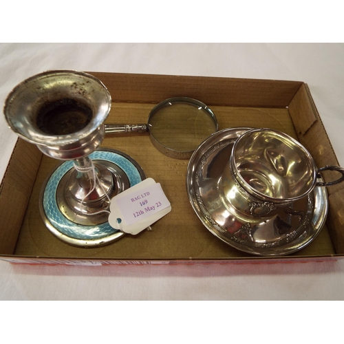 169 - A silver child's christening cup and saucer, a silver and enamel candlestick and a silver handled ma... 