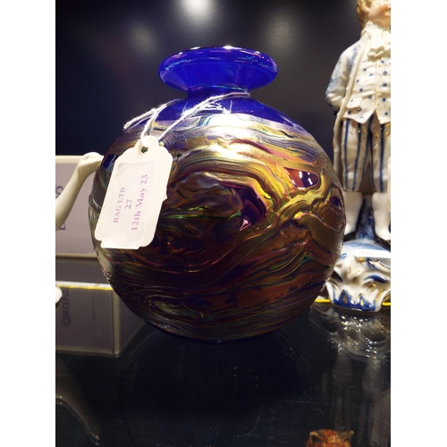 27 - An iridescent glass vase signed to base