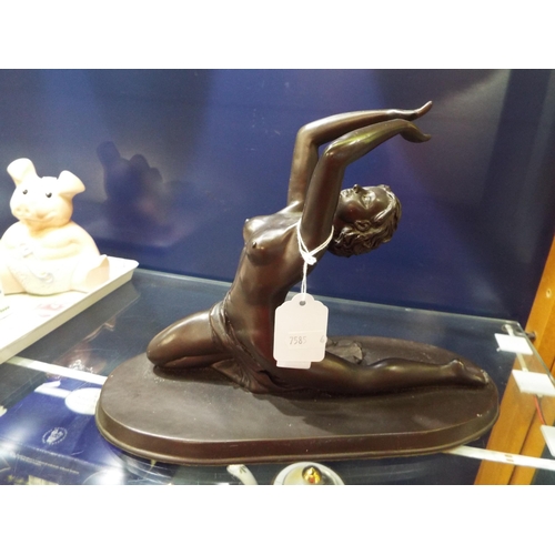 68 - A moulded brass model of a girl dancer