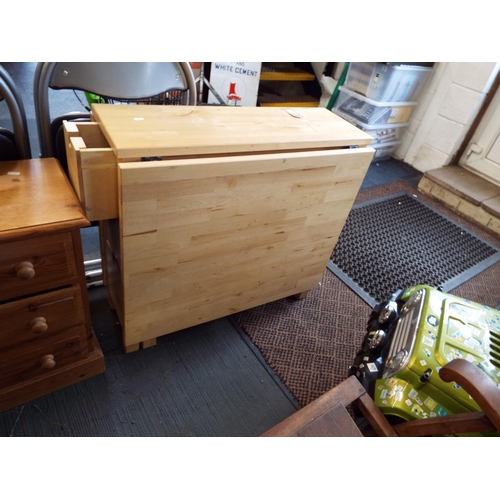 619 - A good quality beech drop leaf table with six short drawers