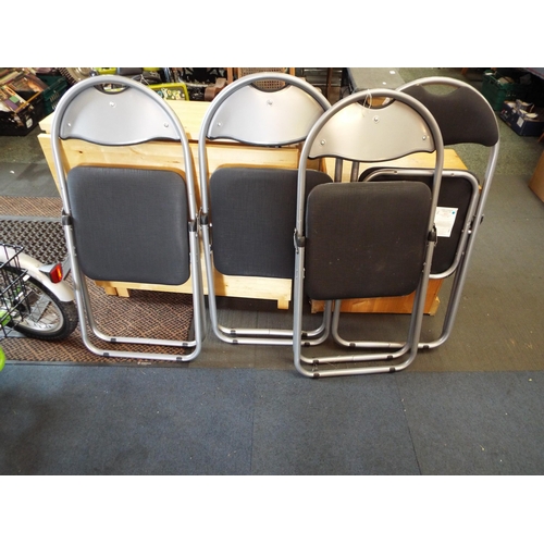 620 - A set of four grey and black folding chairs