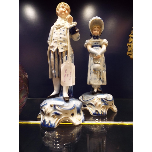 Two Dresden figurines of a male and female marks to base and stamped
