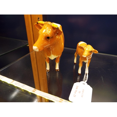 10 - A Beswick Guernsey cow and calf