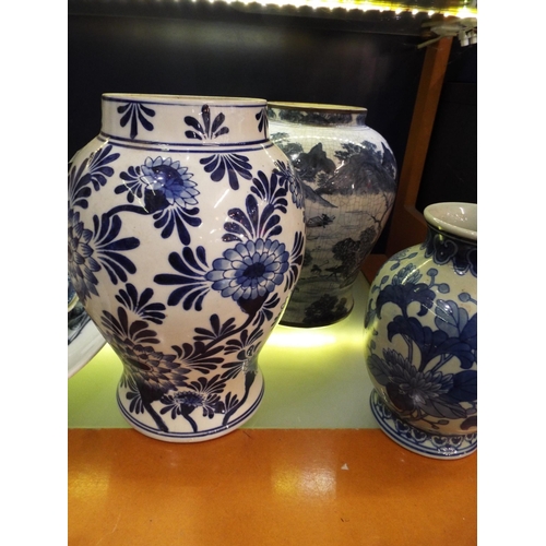 102 - Three blue and white vases