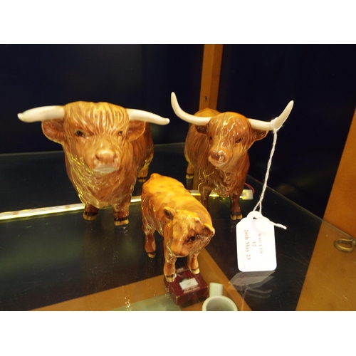 12 - A Beswick Highland Bull, cow and calf