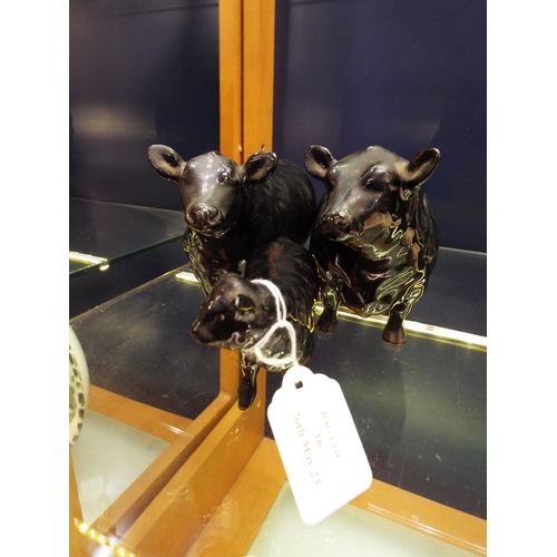 16 - A Beswick Aberdeen Angus bull, cow and calf