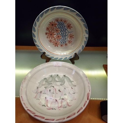 17 - Two Rye pottery shallow bowls with floral decoration signed Tarquin Cole