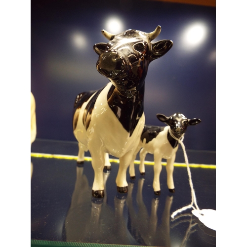 4 - A Beswick Claybury Friesian cow and calf