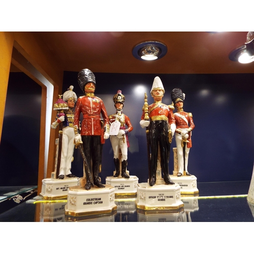 42 - A group of five porcelain soldier figurines