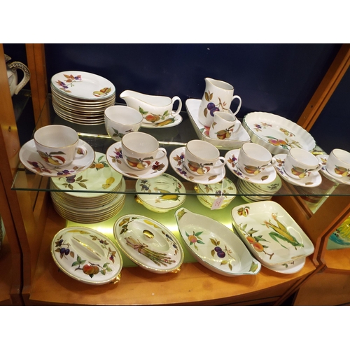 55 - A large selection of Royal Worcester 'Evesham' china to include cups, saucer, tureen's, bowls, dinne... 