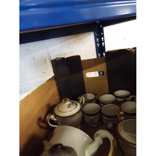 347 - A Japanese eggshell tea-set with pagoda decoration and Geisha to base