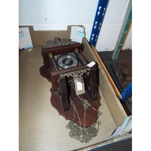 354 - An ornate hanging wall clock