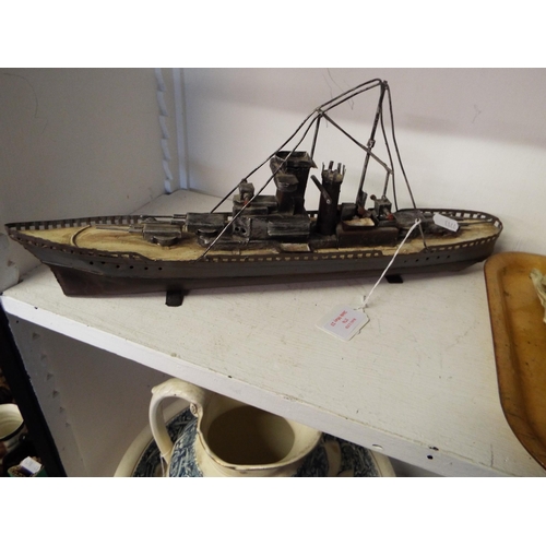 376 - A tinplate model Warship