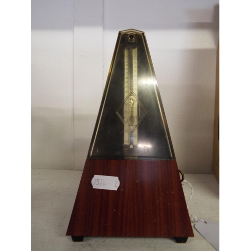 394 - A vintage metronome