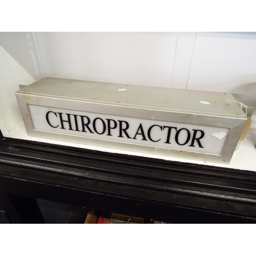 399 - A metal illuminating Chiropractor sign