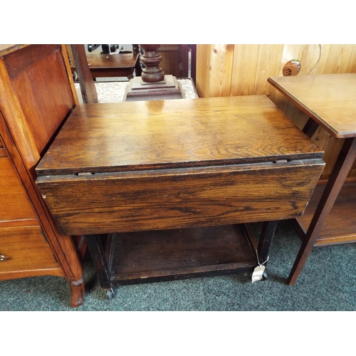 506 - An oak drop leaf tea trolley