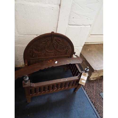 509 - A cast iron fire basket and grate