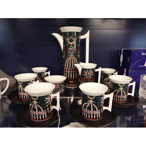 53 - A Portmeirion 'Magic City' six person coffee set designed by Susan Williams-Ellis, to include cups, ... 