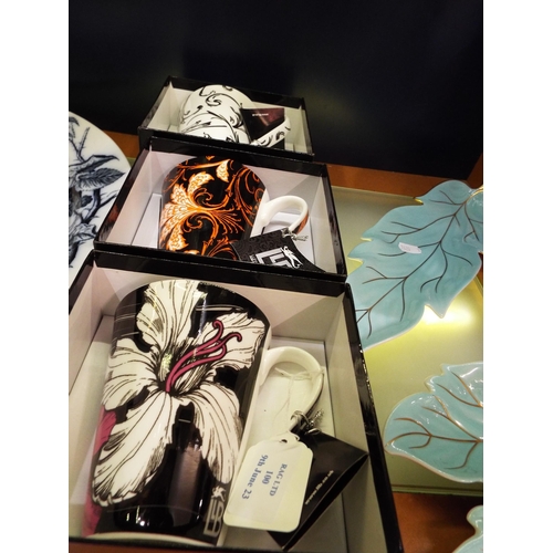 100 - Three boxed Royal Worcester Llewelyn-Bowen mugs 'Legacy', 'Arabesque' and 'Anoushka'