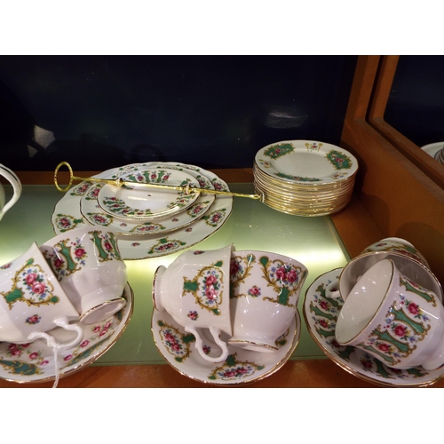 60 - A Gainsborough bone china tea-set comprising cups, saucers, sandwich plate and cake plate