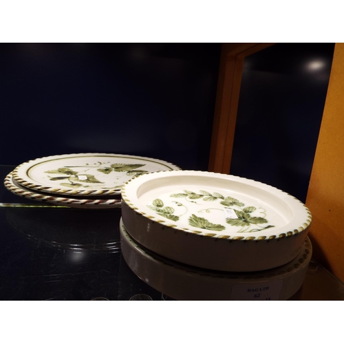 62 - Two Rye pottery dinner plates and two shallow bowls with hop and vine decoration