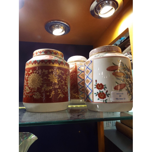 89 - A Japanese lidded ginger jar and two caddies