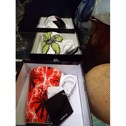 97 - Three boxed Royal Worcester Llewelyn-Bowen mugs 'BEBE', 'Burlesque' and 'Creole'