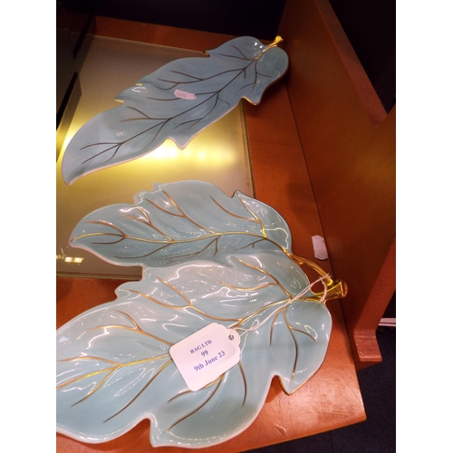99 - Two Carlton ware hand-painted 'leaf' dishes in green and gilt colourway