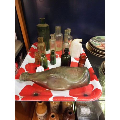111 - A mixed selection of vintage bottles to include 'Knowles & Tampkins Grays', 'Oxo 1oz', 'Eiffel Tower... 