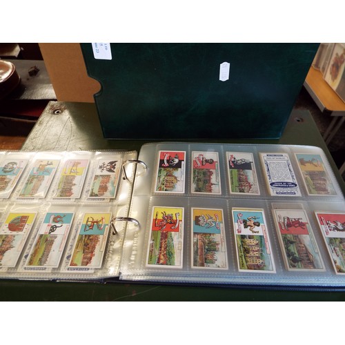 115 - An album of seventeen sets of Players cigarette cards to include Regiment, Flags & Emblems