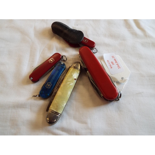 109 - A selection of five pen knifes