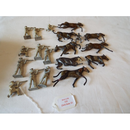 123 - A mixed selection of lead soldiers and horses