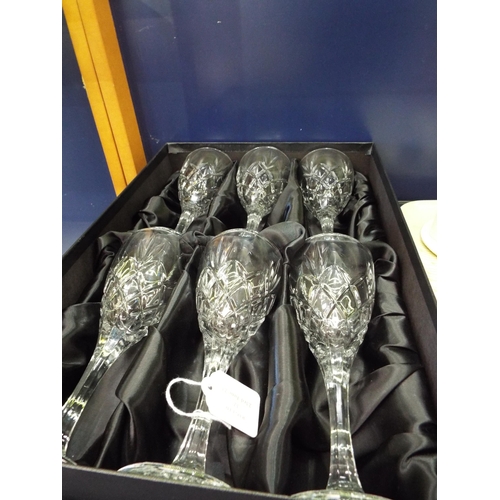 32 - A box of six Royal Doulton crystal wine glasses
