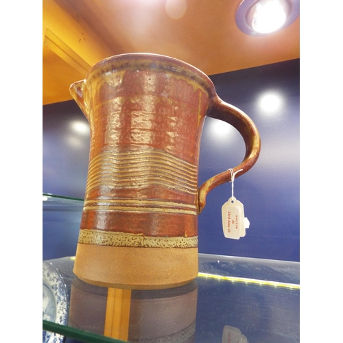 46 - A Donald Granville studio pottery rustic ware jug