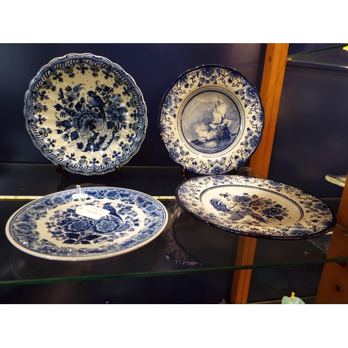 58 - Four Delft blue and white cabinet plates