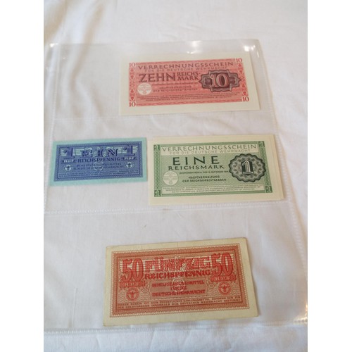 147 - A selection of Wartime banknotes in 7 sleeves to include Hungary, Lithuania, Japanese, Burma