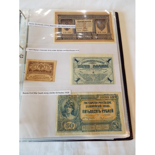 149 - An album of WWII banknotes to include Russian Civil war 1909 State Credit note, Alexander III Credit... 