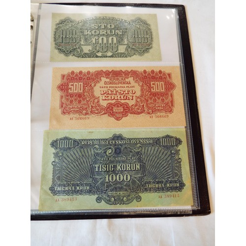 149 - An album of WWII banknotes to include Russian Civil war 1909 State Credit note, Alexander III Credit... 