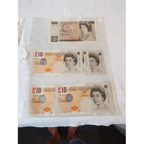 153 - Two sleeves of Bank of England £10 notes to include Page