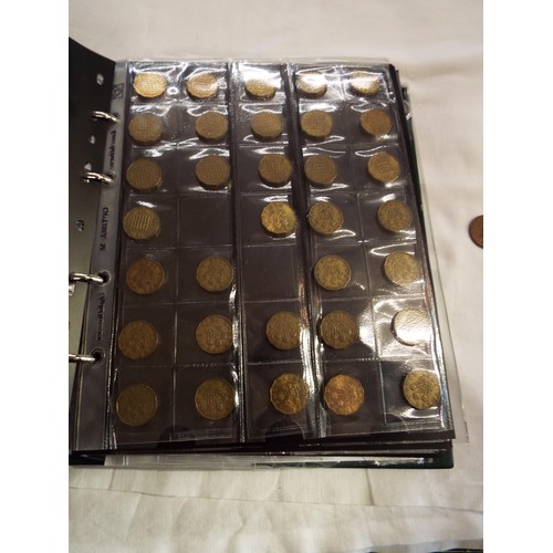 165 - A collector's album of coins to include copper 2p, bronze 2p, farthings, 3d pieces