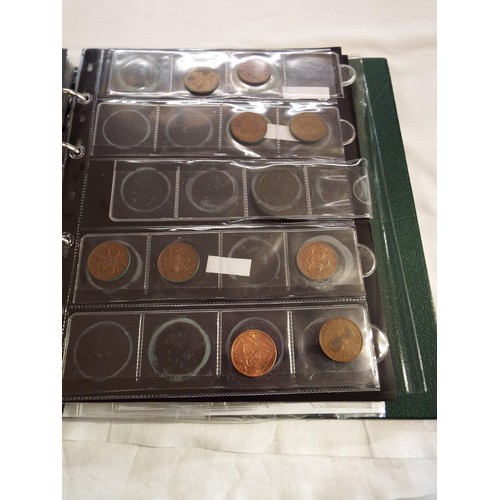 165 - A collector's album of coins to include copper 2p, bronze 2p, farthings, 3d pieces