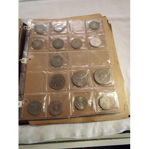 166 - An album of coins to include half crowns, florins, crowns, two shillings, some Victorian examples, o... 