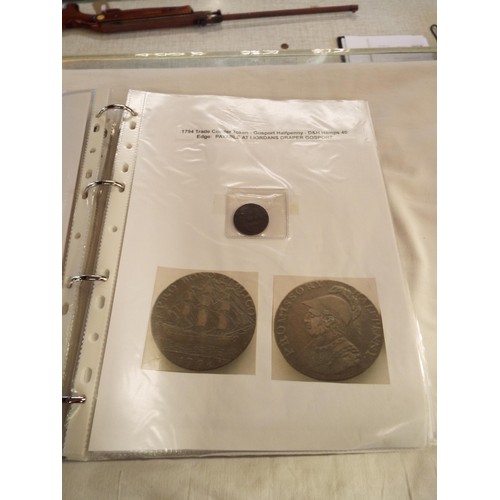 168 - An album containing tokens, half penny tokens from 1700's to 1800 all with paperwork to include Port... 