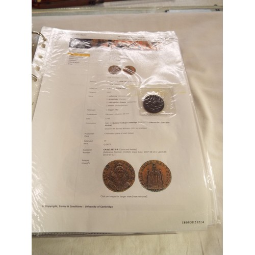 168 - An album containing tokens, half penny tokens from 1700's to 1800 all with paperwork to include Port... 